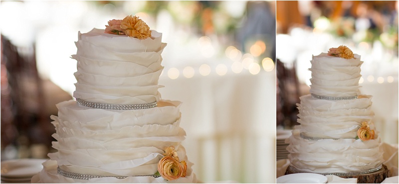 rustic orange and ivory floral wedding cake with bling