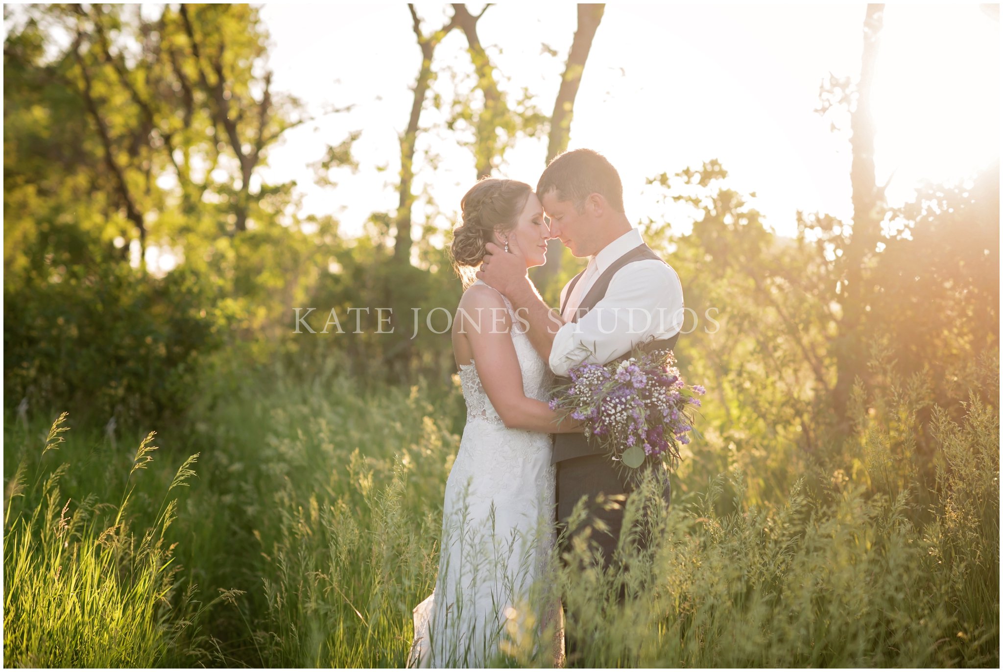 private moment for bride and groom at sunset
