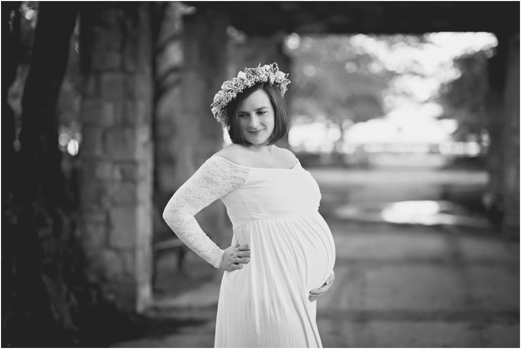 White dress maternity session floral crown at Jane Addams Memorial Park