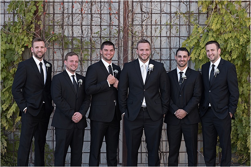 black suit groomsmen fall wedding
