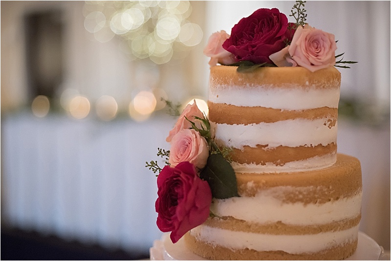 rustic glam wedding cake with floral accents