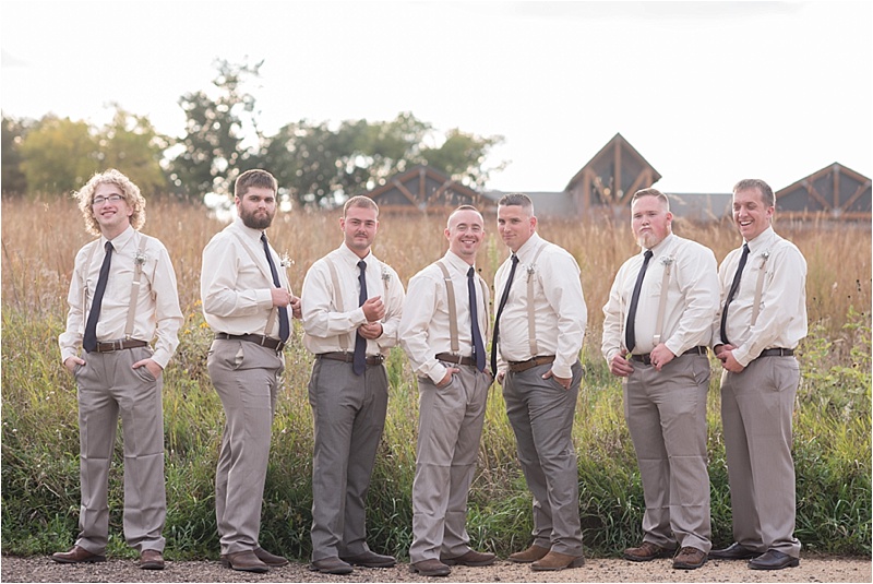 ivory and plum with khaki suspenders groomsmen suits