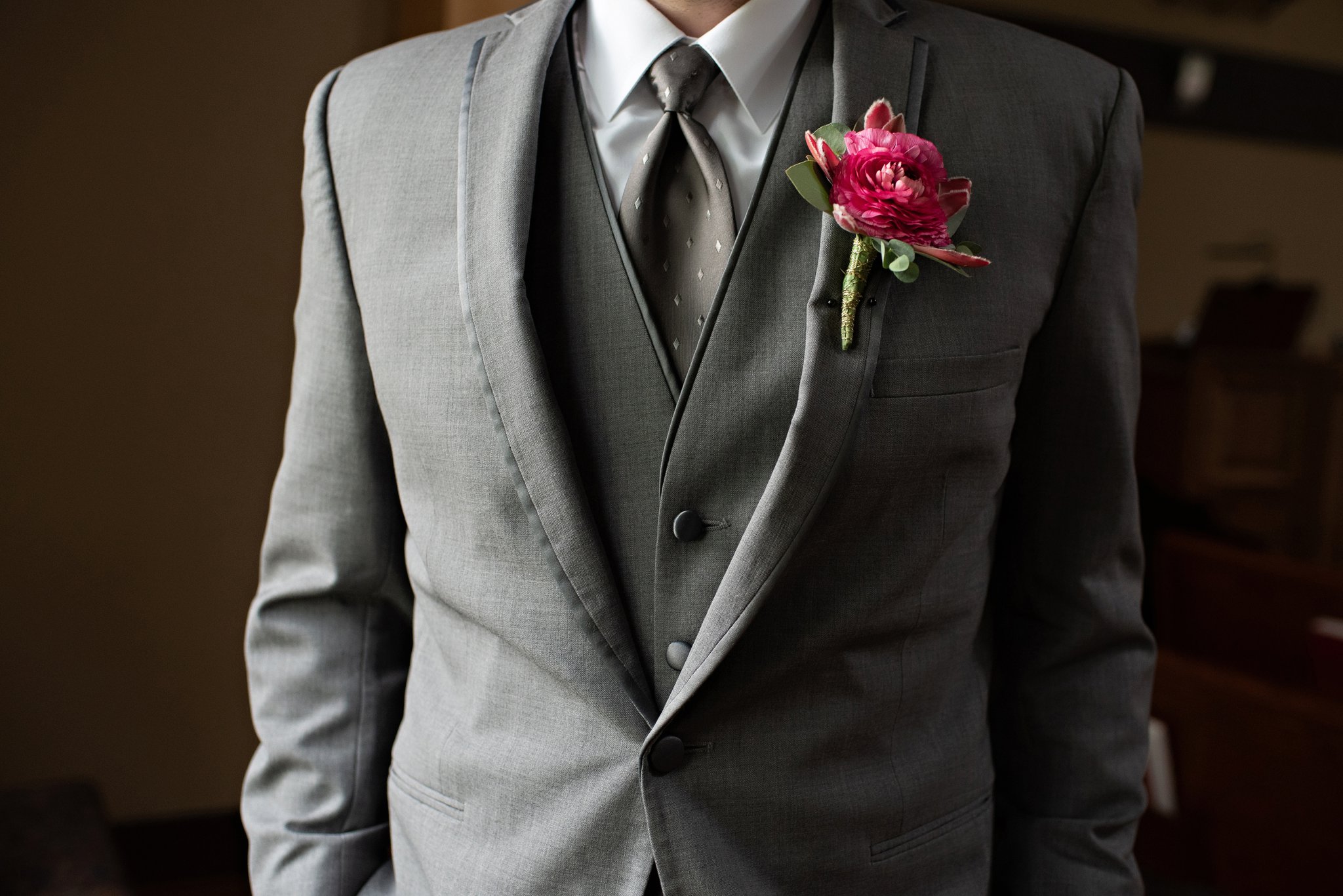 charcoal gray three piece suit