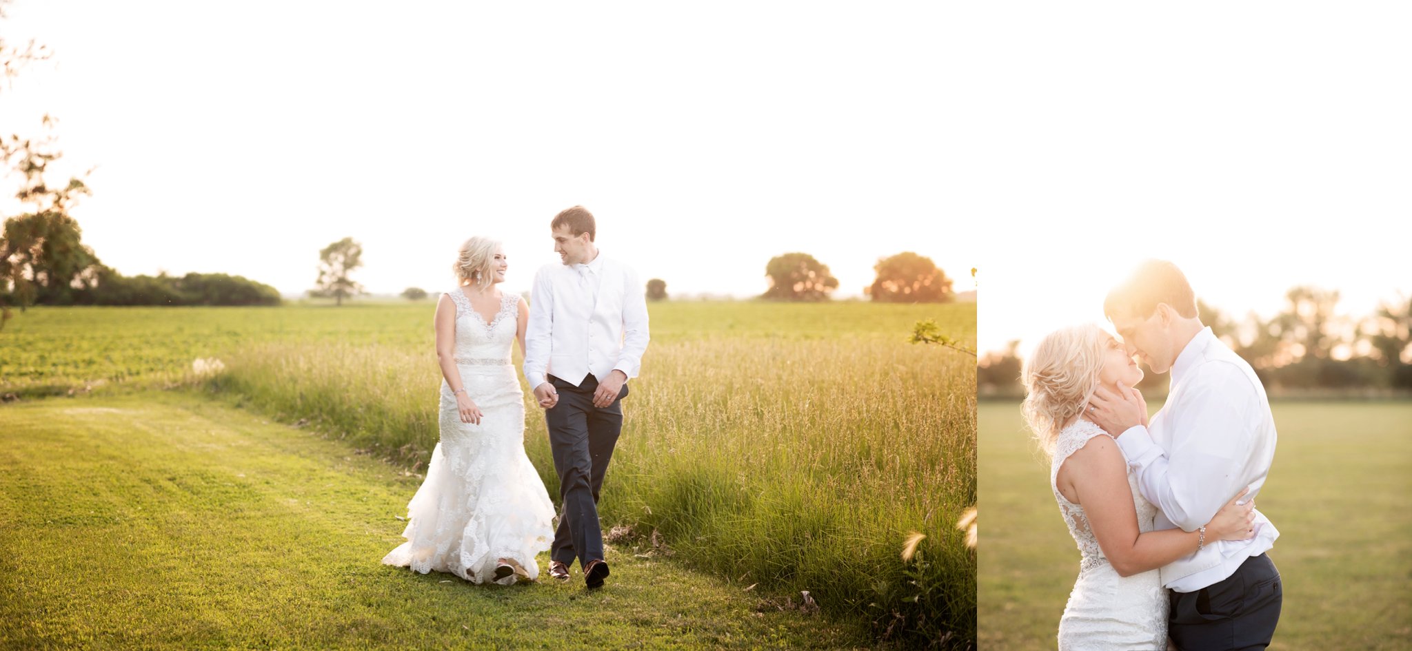 bride and groom walk through field together holding hands