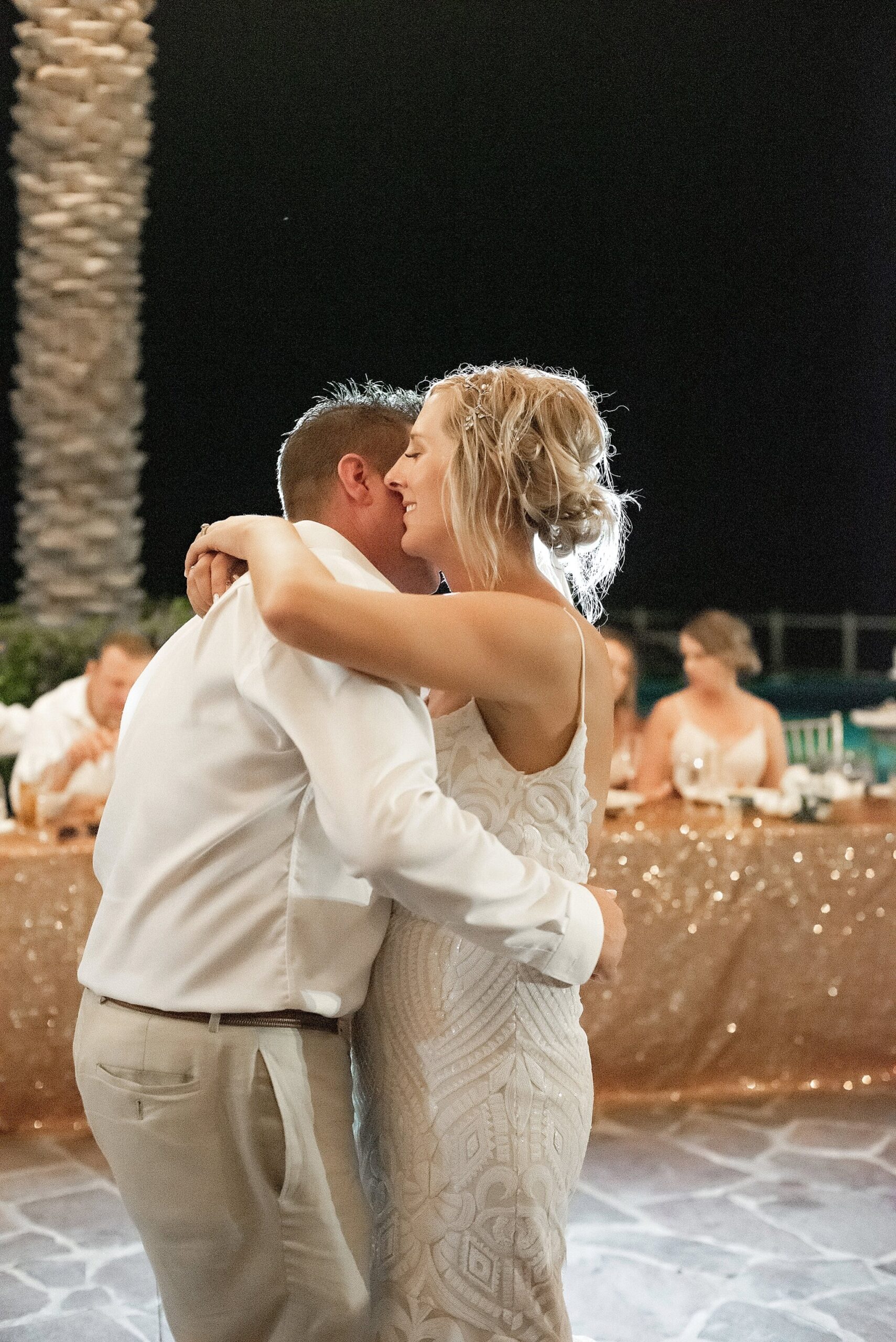 first dance at rooftop poolside wedding reception destination pueblo bonito sunset beach mexico