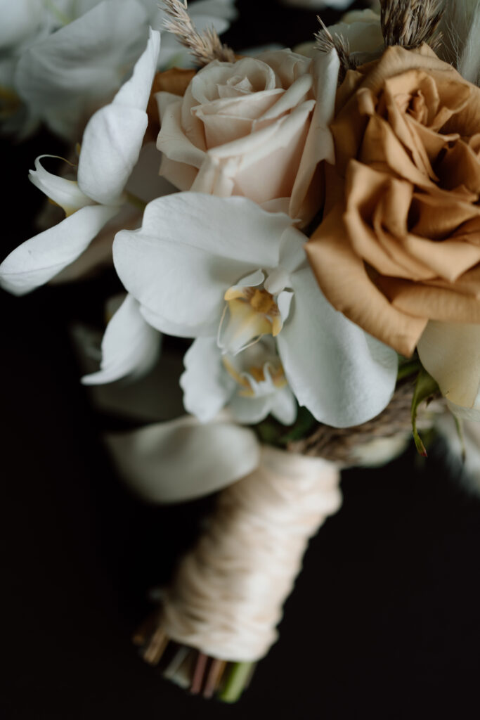 Bride florals roses and orchids at The Atrium at Blue Haven